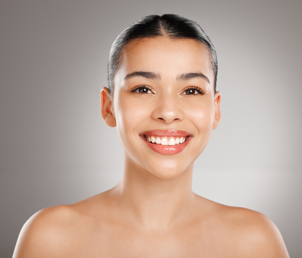 Woman with bright, glowing skin from DiamondGlow Facial in Aspen, CO.
